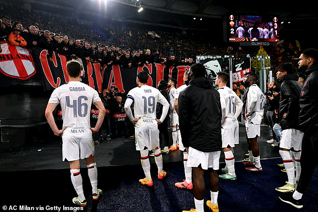 SO BAD: AC Milan players are challenged by the club's ultras following their Europa League defeat to Roma.