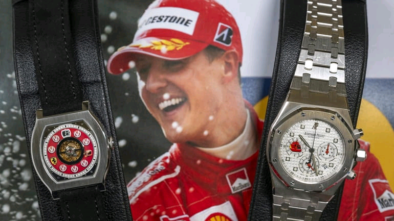 F1 legend owns eight watches. Michael Schumacher earns more than $4 million at auction in Geneva.